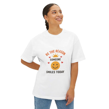 Woman wearing white oversized smiley face quote tee