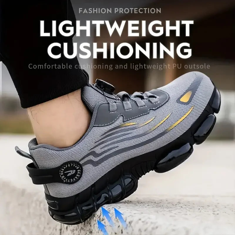 Grey athletic steel toe shoe worn on foot, showing the side profile and black outsole.