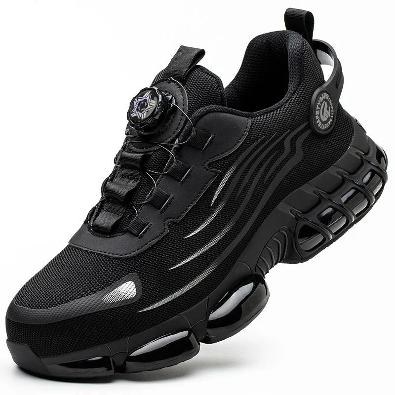 Black athletic steel toe shoe with silver accents, mesh upper and black segmented sole.