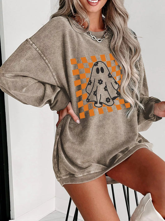 Halloween ghost sweatshirt styled with jeans for cozy fall nights