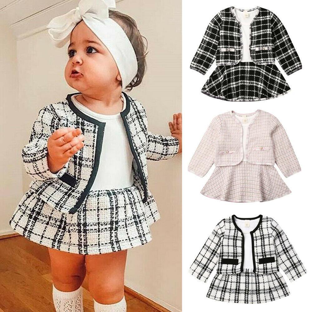 Layer tights and boots under the Girls Plaid Fall Two-Piece Set for extra warmth on crisp autumn days.

