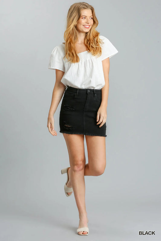 Lifestyle – skirt styled with tee & sneakers for streetwear vibe


