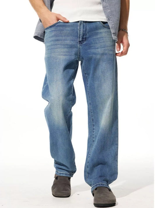 Men’s washed wide leg jeans styled with tees and sneakers – effortless everyday denim