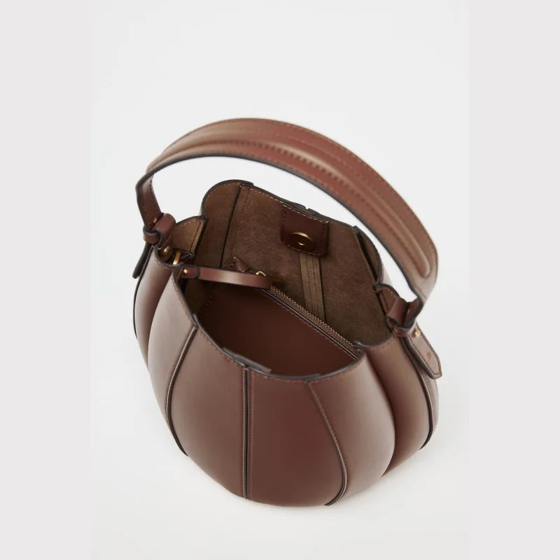 Minimalist bucket bag for work to weekend