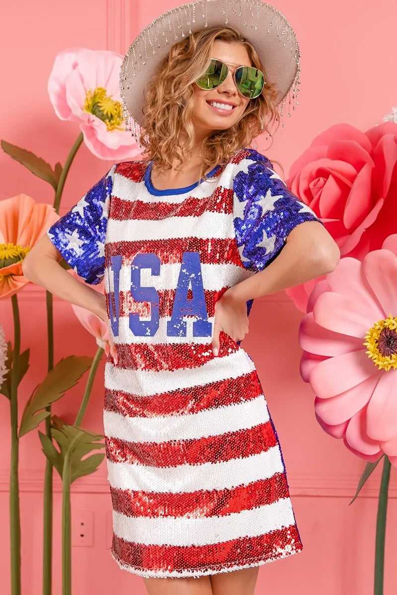 Model dancing in USA flag sequin dress at rooftop party

