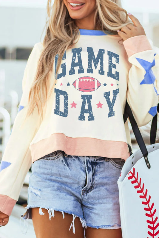 Model wearing game day sweatshirt showing full length relaxed silhouette and comfortable oversized design

