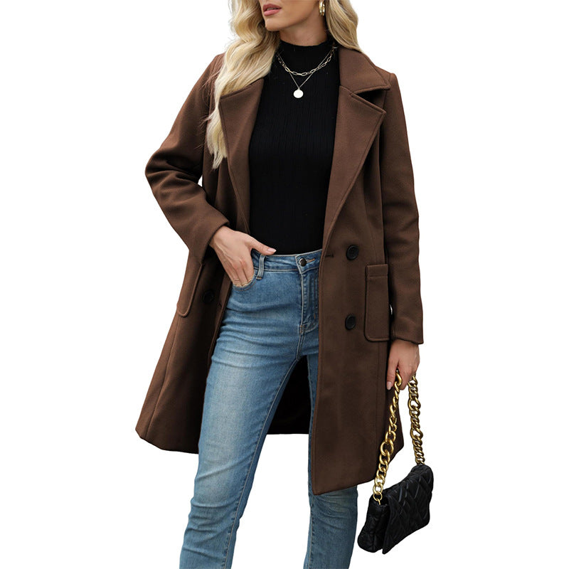 Dark brown coat styled with jeans