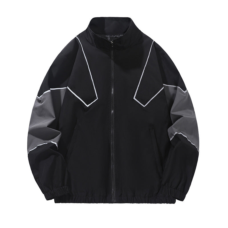 Black and gray style 6657 jacket full front with angular piping, stand collar, zip front and gathered cuffs and hem on white.