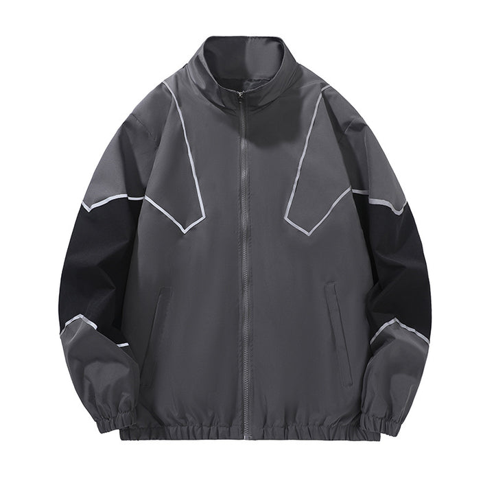 Gray and black style 6657 jacket full front with angular piping, stand collar, zip front and gathered cuffs and hem on white.