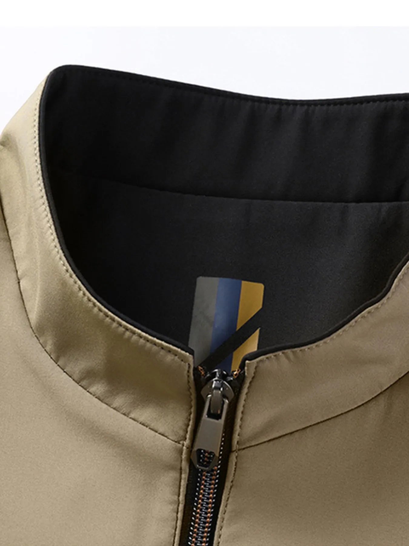 Office Casual: Polyester Zipper Jacket Layered Over a Blouse

