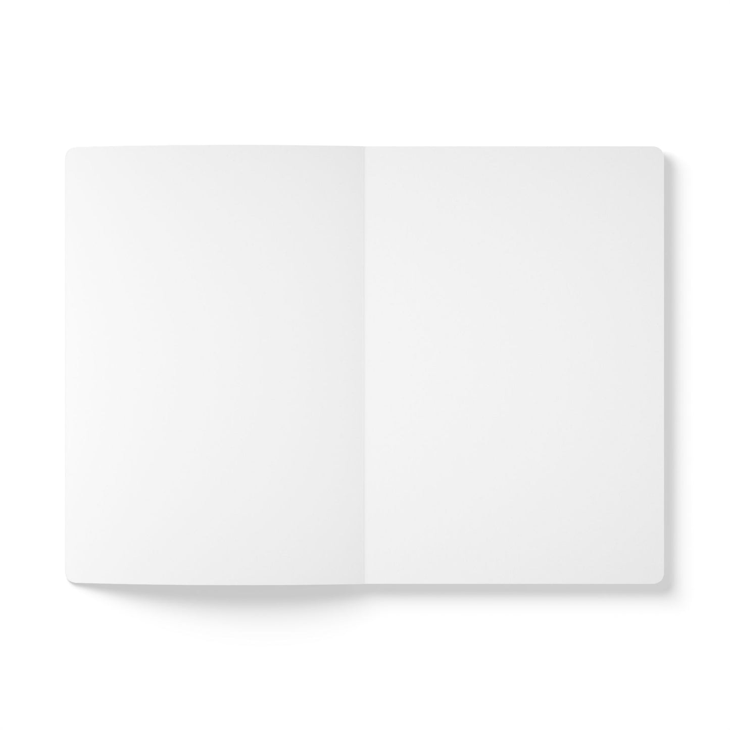 Open softcover journal with blank white pages