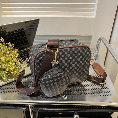Plaid PU crossbody and mini bag duo with shoulder strap secure zip, medium hardness holds shape, perfect from desk to dinner.