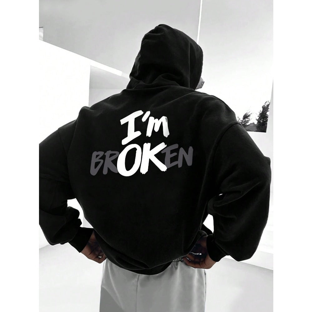 Long sleeve hoodie styled with joggers and sneakers.

