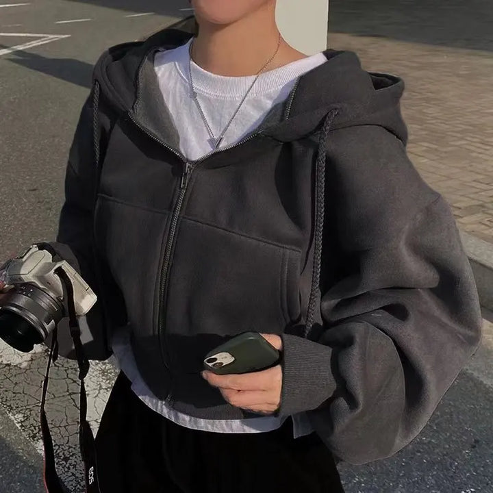 Black cropped full zip hoodie shown on a model, with the original visual details, retained from the original product gallery.