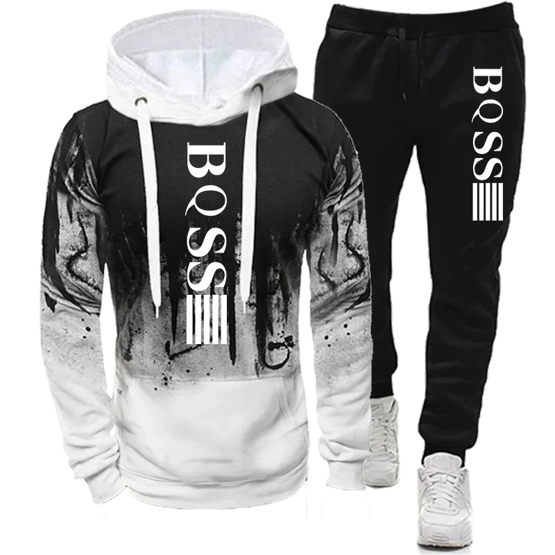 "polyester splash ink tracksuit set for men full sleeve hoodie and tapered pants perfect for flights and long road trips"
