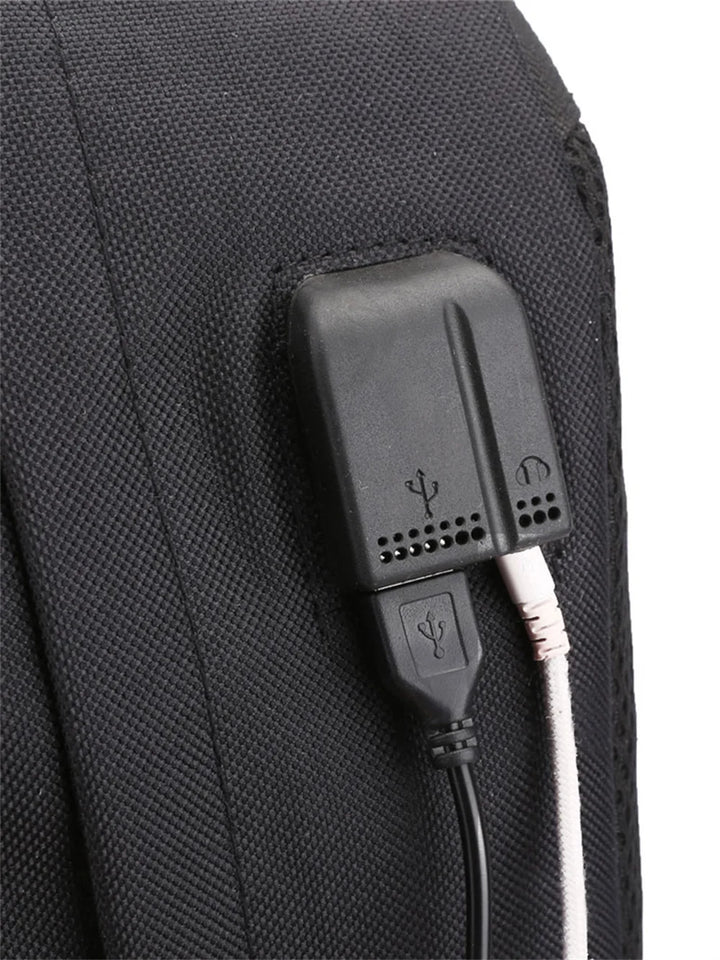Close view of the side USB port with a connected white cable on the black bag in an original supplier construction reference.