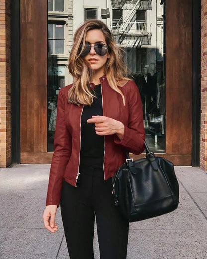 Women PU leather bomber jacket folded flat showing lightweight standard thickness for packable travel wear
