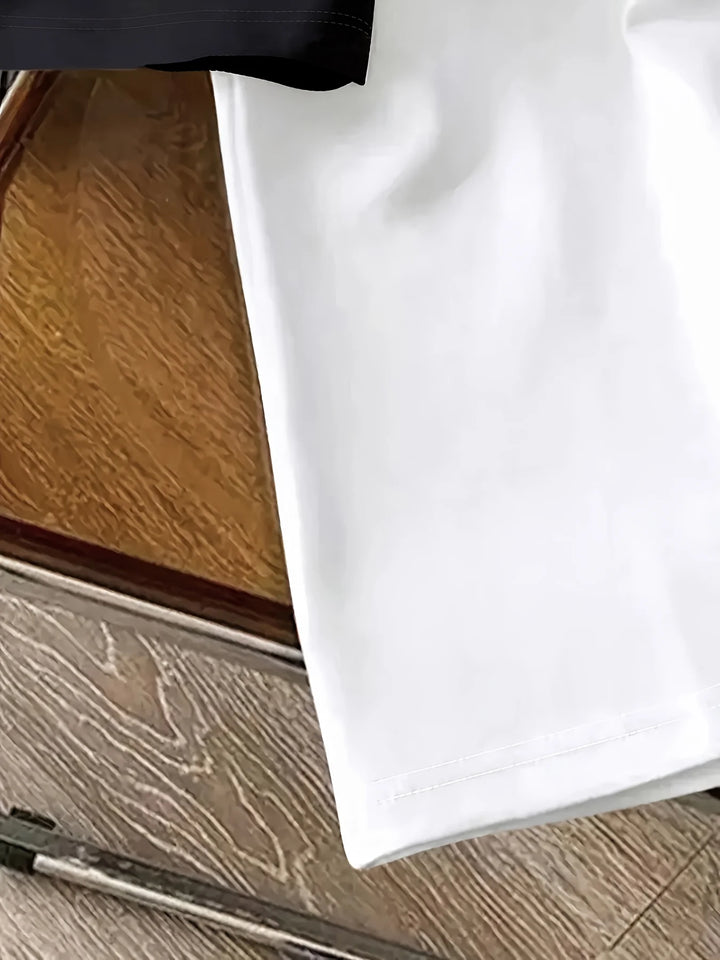 Original detail photo of the white body and hem stitching
