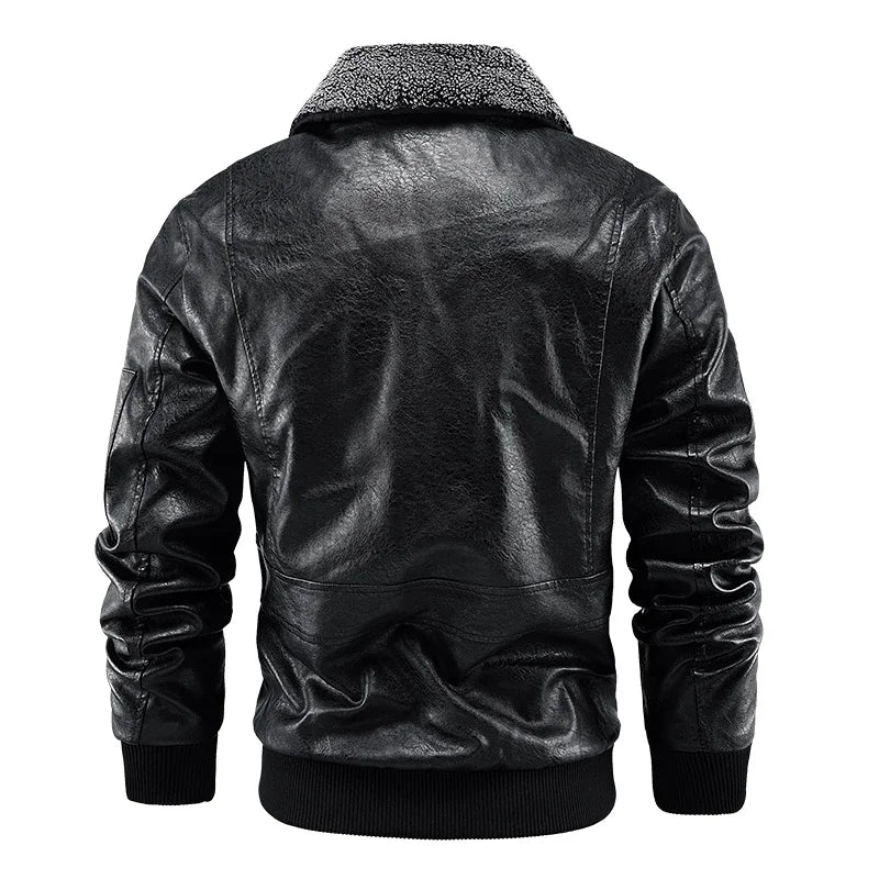 Black jacket rear view with a plain back, shoulder seams, textured collar and ribbed hem.