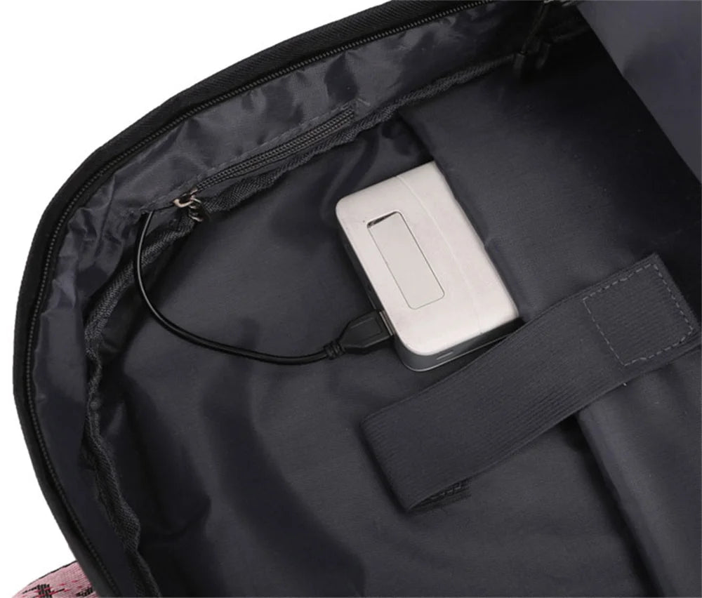 Interior USB cable routing reference inside the black bag with a power bank shown; included power accessories are unverified.