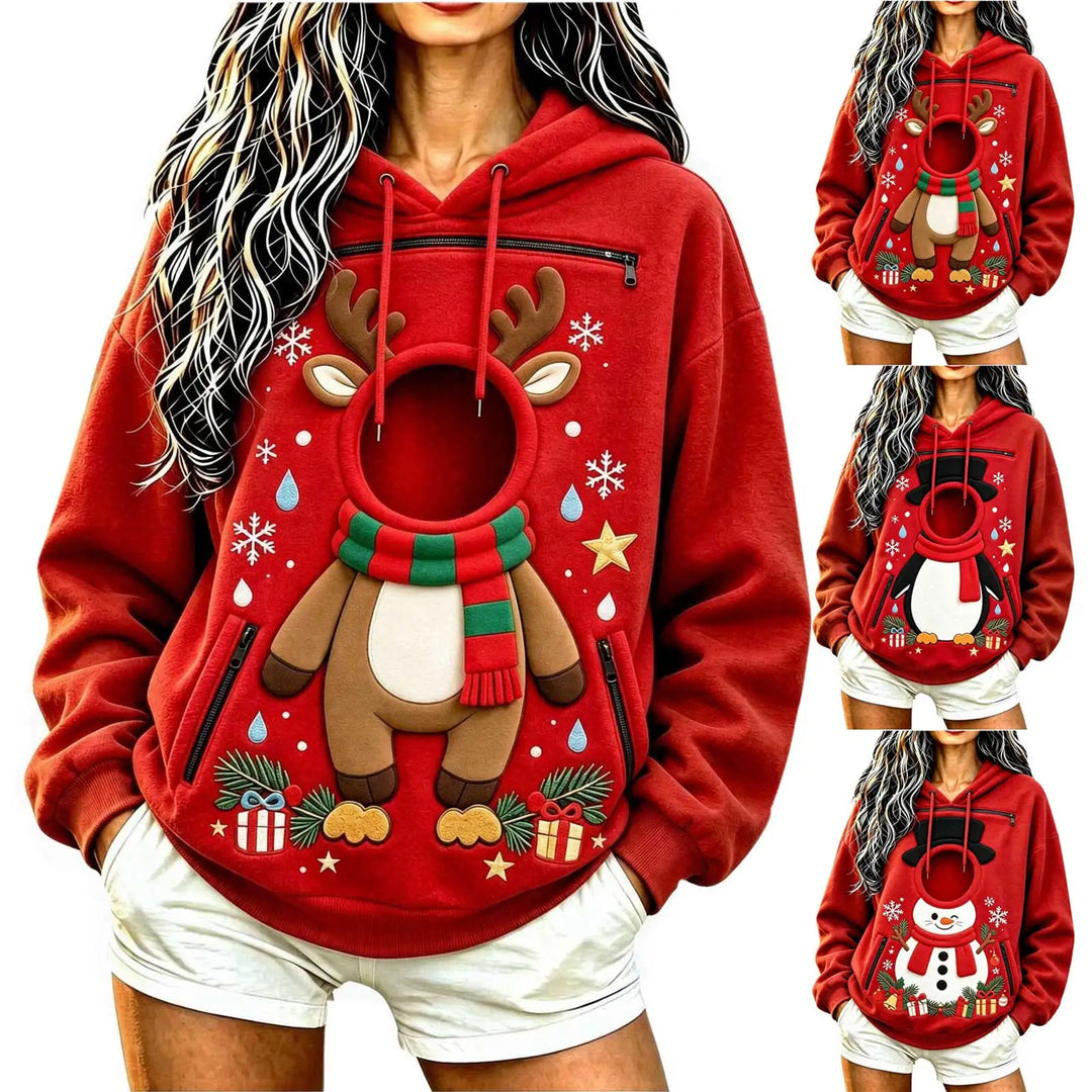 Cropped studio model in a red Christmas hoodie showing three festive prints, circular front openings, long sleeves and hoods.