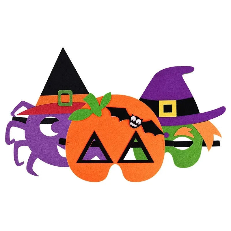 Purple spider, orange pumpkin with bat detail and green witch felt costume masks overlapping against a plain white background
