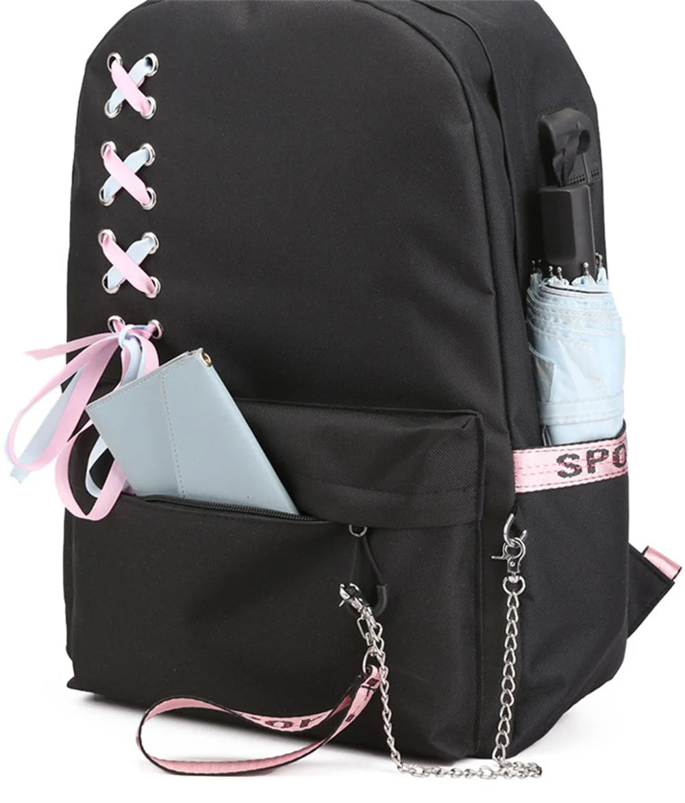 Three-quarter base construction image with the pink ribbon bow and chain with phone and bottle props next to the side pocket.