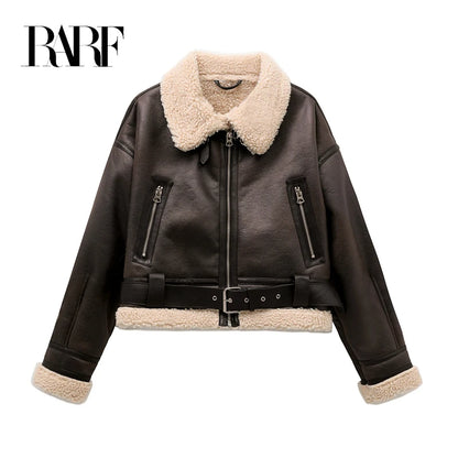Faux fur coat women close-up of plush faux shearling fabric and zipper detail, expensive-looking winter outerwear
