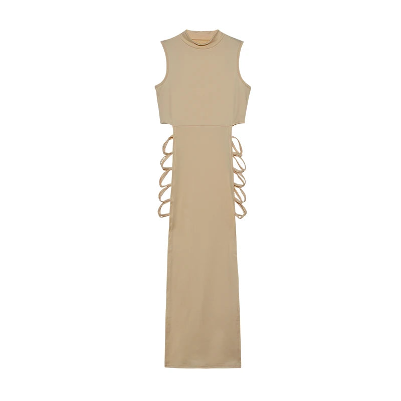 Maxi dress product image showing the long solid-color silhouette, high neckline and distinctive criss cross side details view