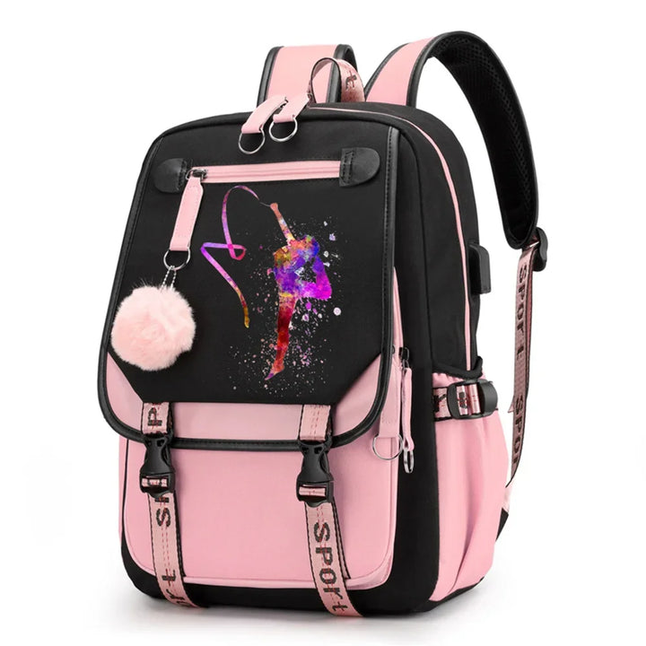 Pink and black backpack in design 1D-35-6 with a colorful gymnast print, buckle straps and pink pendant, shown against white.