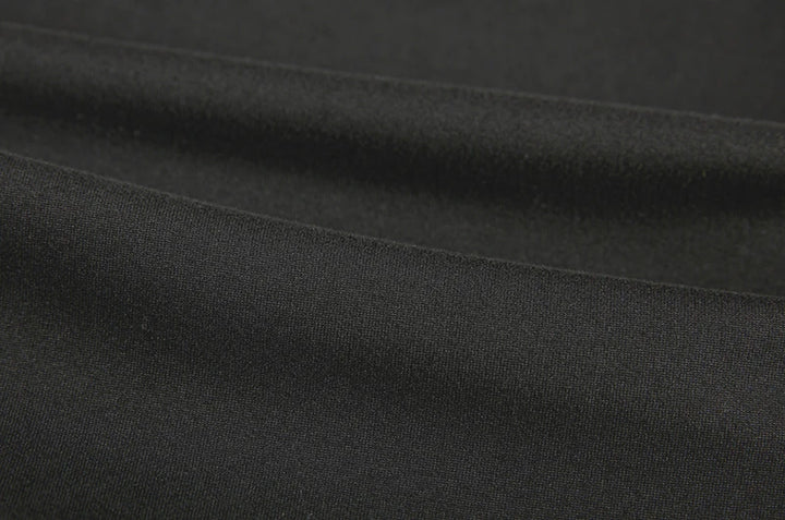 Maxi dress product image showing the sleeveless shape, long hemline and open side sections connected by multiple straps view.