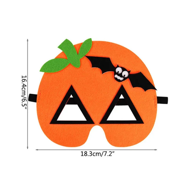 Orange pumpkin felt mask with triangular eye openings, green leaves and black bat, shown with source width and height labels.