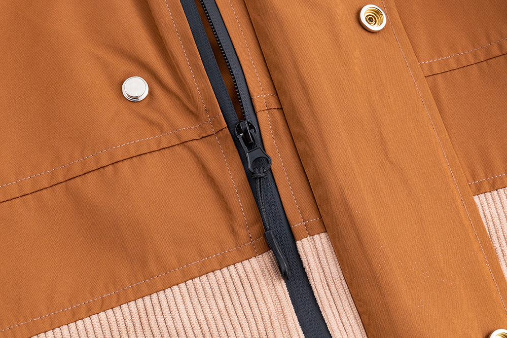 Side profile – suit beads water during downpour


