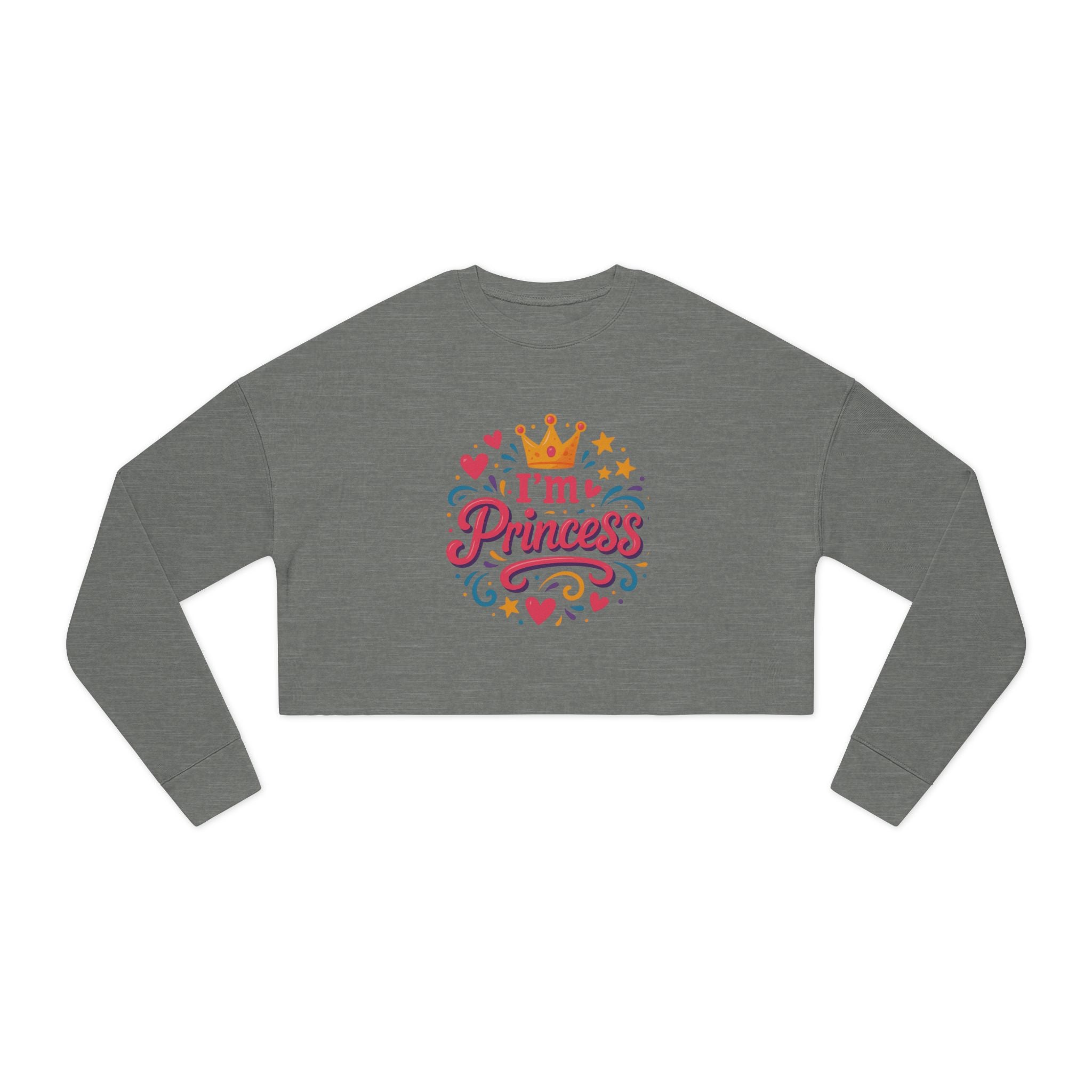 Refined cropped sweatshirt styled indoors with soft throws and candles

