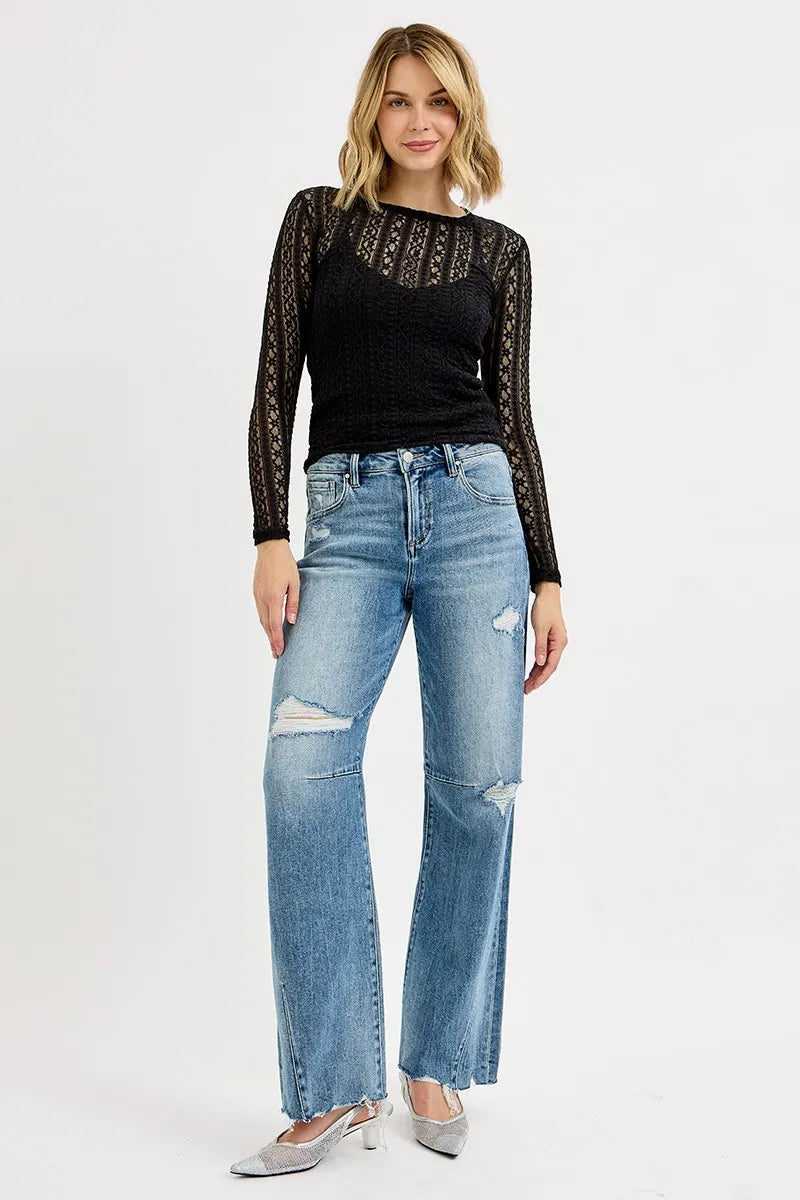 Tie-washed wide leg jeans – raw hem detail close-up