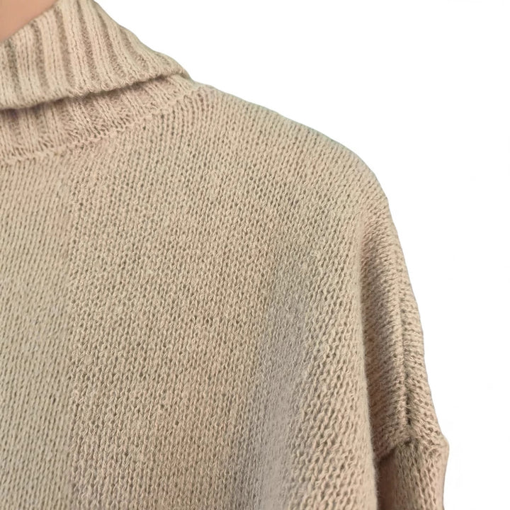 Timeless khaki turtleneck sweater – laid-back pullover with drop-shoulder for winter elegance.