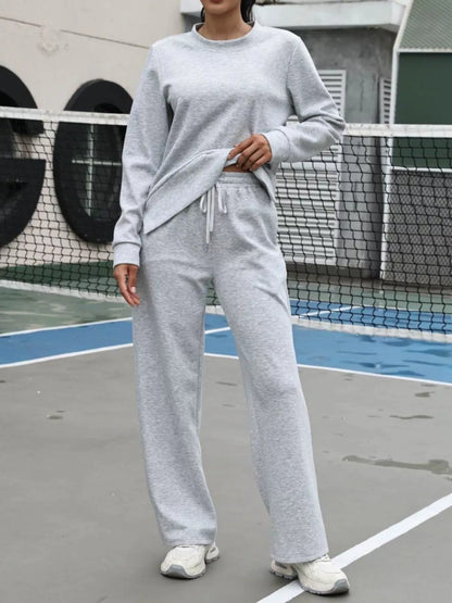 Two-piece sweatshirt and pants matching set perfect for home wear coffee runs and relaxed weekends
