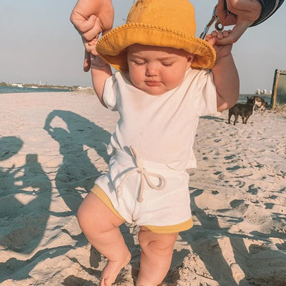 Vibrant colors available in this trimmed clean infant two-piece set for infants.