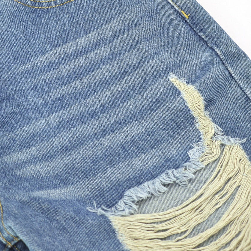 Women's high-waist jeans in timeless blue denim, perfect for chic, all-day comfort.