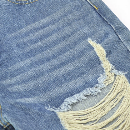 Women's high-waist jeans in timeless blue denim, perfect for chic, all-day comfort.