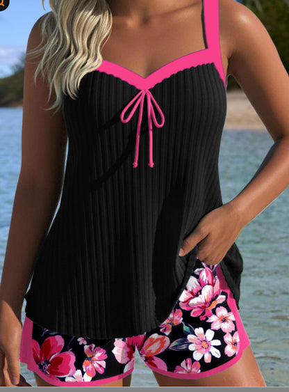 Women’s swimsuit with shorts – black shorts, printed top, beach-ready style for summer travel