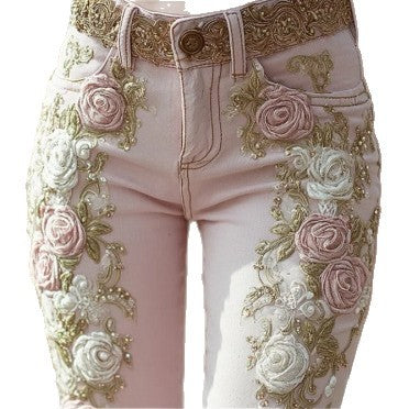 Pink rose embroidered jeans folded fabric texture, nylon blend with polyester fiber finish, soft conventional weight
