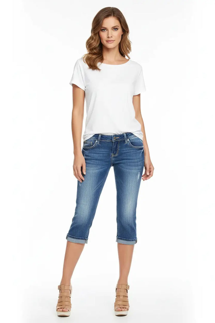 women's mid rise denim capri jeans styled with white sneakers relaxed weekend look