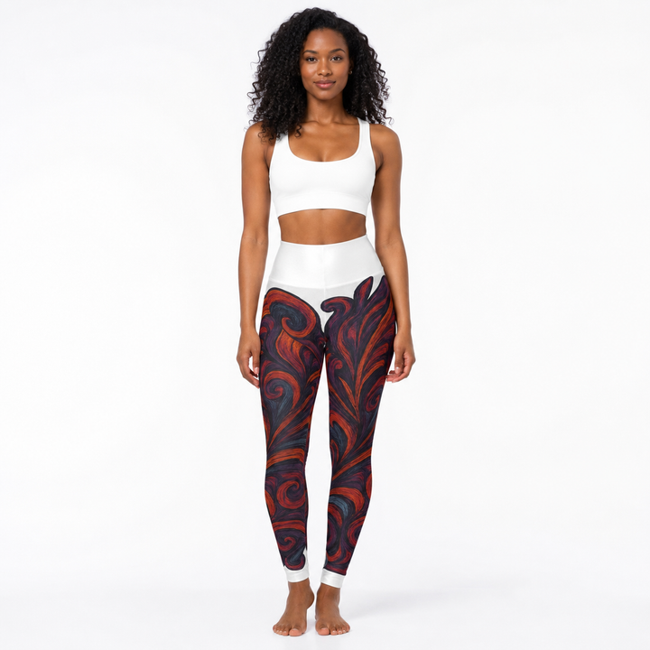 High waisted yoga leggings shown in a front view showing the artistic all-over print and raised waistband for product detail.