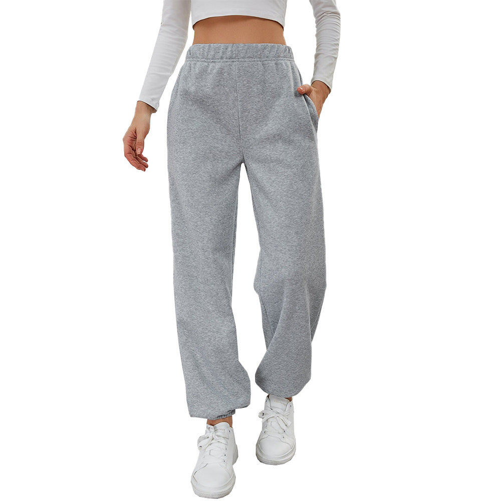 fleece lined straight pants women hip and leg close up straight type flattering drape gray tone
