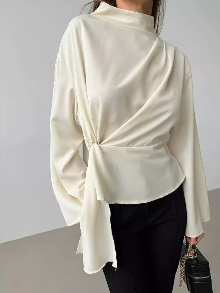 Zipper blouse for women ruched mock neck top side view highlighting sculpted ruching and clean neckline finish
