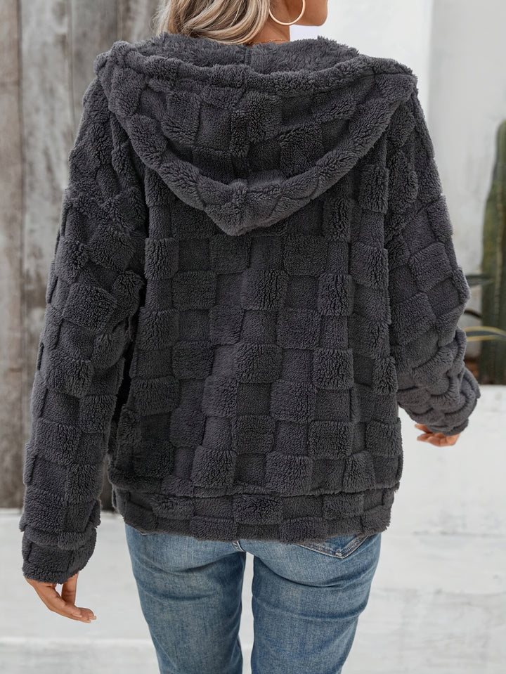 Plush hooded zip-up jacket on a professional model in natural side pose showing regular fit, long sleeves and casual styling.