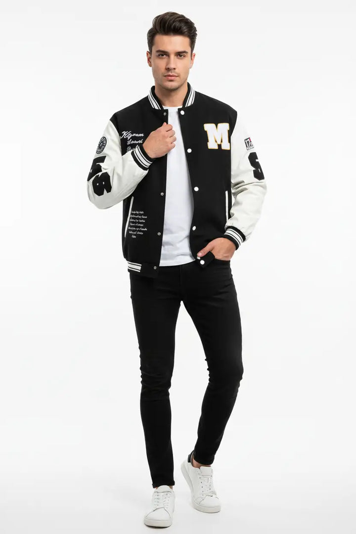 men's baseball jacket long sleeve streetwear layered over white tee outdoor context