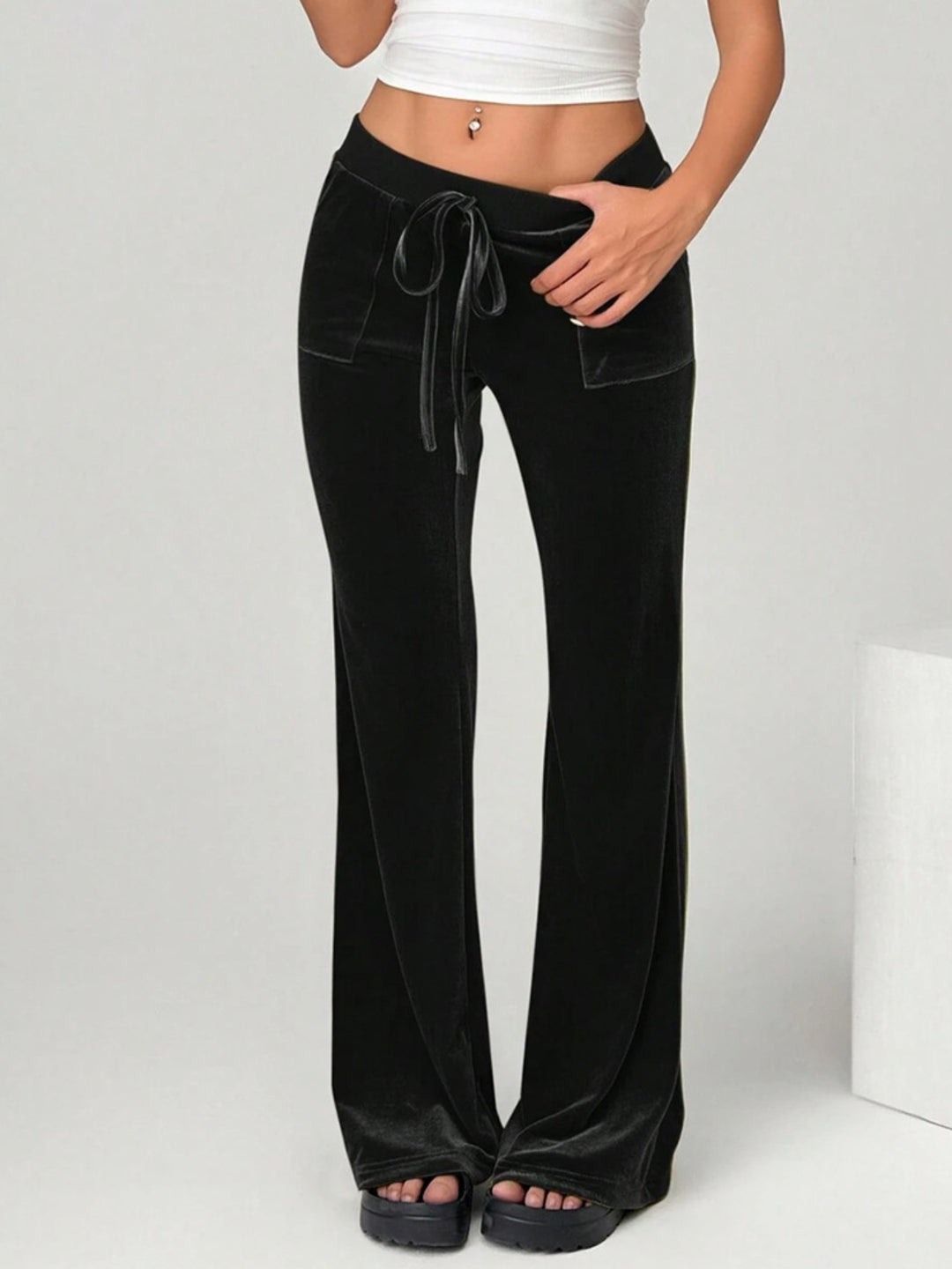 velvet flare pants minimalist outfit combination clean urban interior