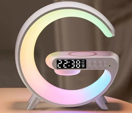 Smart lamp detail with app control, Bluetooth audio, wireless charging, digital time display and customizable alarm settings.
